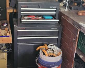Craftsman rolling tool box and various hand tools.