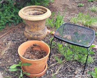 Pots and a garden stool.