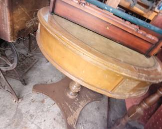 A table and a better look at the bottom of the Singer sewing machine cabinet
