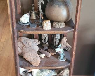 Pottery, figures, petrified wood, hand made shelf.