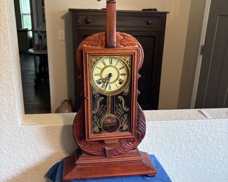 Loads of clocks including this violin clock