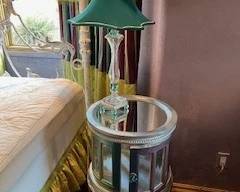 mirrored bedside table with lamp