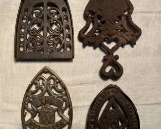 Old Cast Iron Trivets Incl. Advertising