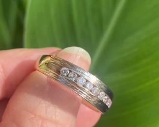 #C. $650. Men ring. approx 1/2 ctw. 14kt yellow ring. 5.7 grams. Size 12 3/4.