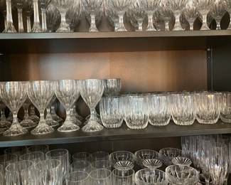#131 - Mikasa Park Lane pattern - 189 pieces - BUY ALL for $1,500 -Hock wine (8), Red Wine (16), White wine (22), Ice water (19), Old fashion (16), Tumblers (7), Martini glasses (8), Digestive (8), Beer steins (8), Irish Coffee mugs (8), Champagne flutes (16), Sherbet Champagne (8), Bud vases (8), Coffee cups with handles (8), Candy dishes (4), Gravy bowl (2), Gravy bowl (2),Compote (8), Water pitcher, Candlesticks 2 tall / 4 smalls, Round veggie/slalad/fruit bowls (2), Trifle bowl (1), Champagne bucket (1) ice bucket (1), Decorative sea shell bowl (1)