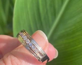 #C. $650. Men ring. approx 1/2 ctw. 14kt yellow ring. 5.7 grams. Size 12 3/4.