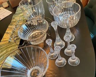 #131 - Mikasa Park Lane pattern - 189 pieces - BUY ALL for $1,500 -Hock wine (8), Red Wine (16), White wine (22), Ice water (19), Old fashion (16), Tumblers (7), Martini glasses (8), Digestive (8), Beer steins (8), Irish Coffee mugs (8), Champagne flutes (16), Sherbet Champagne (8), Bud vases (8), Coffee cups with handles (8), Candy dishes (4), Gravy bowl (2), Gravy bowl (2),Compote (8), Water pitcher, Candlesticks 2 tall / 4 smalls, Round veggie/slalad/fruit bowls (2), Trifle bowl (1), Champagne bucket (1) ice bucket (1), Decorative sea shell bowl (1)