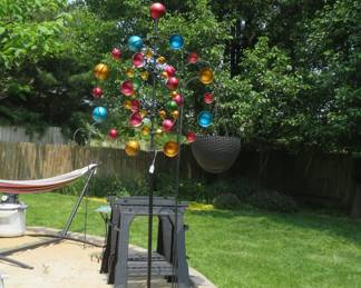 Love this colorful lawn ornament.