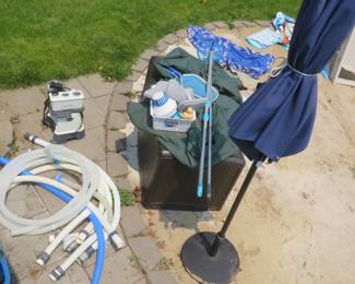 Miscellaneous pool filter items and patio umbrella.