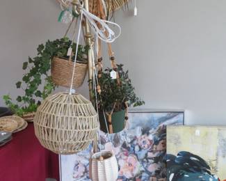 Mushroom coat rack filled with real plants.