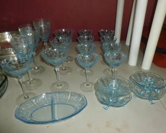 Gorgeous elegant glass in blue with cleaar stems, dish & candle holders