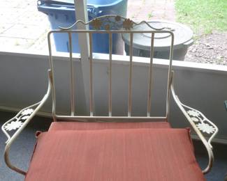 chair behind cushions..Woodard