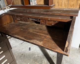 Roll top desk, in need of restoration.