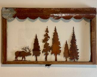 Metal art in vintage wood window frame