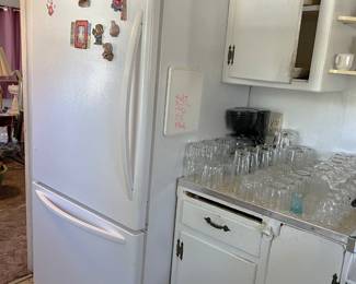 There is also a number of glass and stemware pieces. But don't forget about the Whirlpool Gold refrigerator.