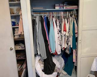 Yes, there are clothes in the sale. If you look carefully in the upper left on the shelves, there is a Pee-Wee Herman doll.