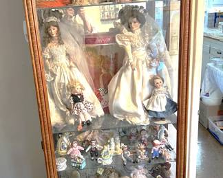 These dolls must be special to be inside the display case, which is also available for sale.