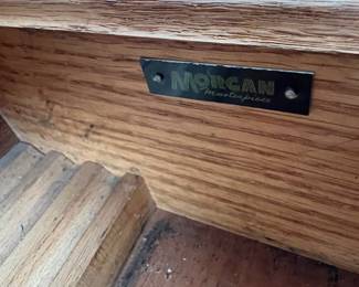 This label belongs to the standalone desk with a drawer, from Morgan Masterpiece. You can see the pencil tray on the left.