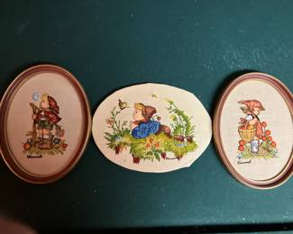 Framed crewel embroidery designed after Hummel figures