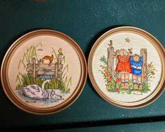 Framed crewel embroidery designed after Hummel figures
