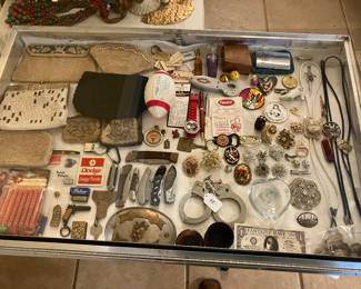 knives, vintage beaded purses, belt buckles, costume jewelry, etc.