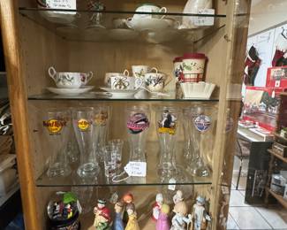 Fitz and Floyd
Hard rock hotel glasses
A Disney snow globe
Bell figurines
Precious moments hairstylist
Flower design tea cups
Crystal vases