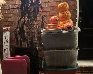 Lights three tubs, orange, purple, and green Halloween tree with orange lights, concrete pumpkins and tombstone lighted pumpkins