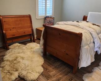 animal skin rug, twin beds