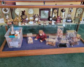 Lg. display case w/clocks & Beanies