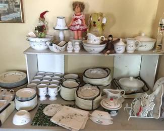 Shirley Temple is admiring the Longaberger dish collection