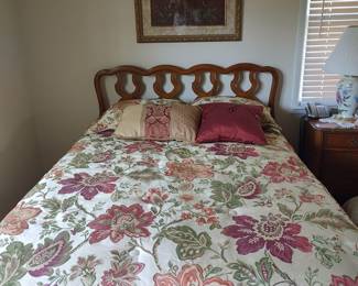 Full size bed by Dixie furniture company.