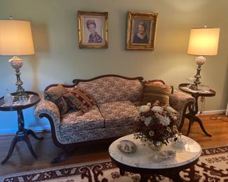 Antique sofa with matching end tables.
