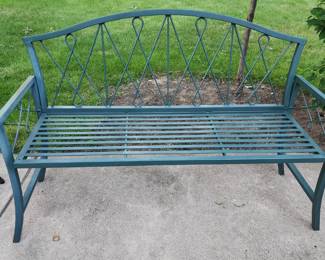 Green wrought iron bench