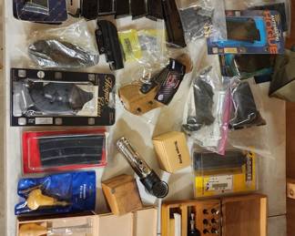 Lots of various gun accessories and parts