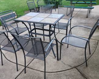 Tile top patoo table, 6 metal chairs