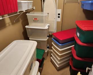 Lots of various sized plastic totes and storage boxes