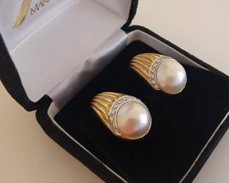Italian Designer Piero Milano - 18K Yellow Gold Pearl and Diamond Clip On Earrings. 14mm half pearl with 10 diamonds set on each earring. The round diamonds are 1mm - total weight of 0.30 carats. G-H Color grade SI1 Clarity. Together weight - 25.3 Grams