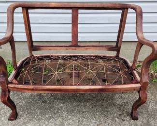 Antique loveseat ready for restoration