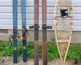 Antique snow skiis and snowshoe