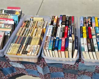 Sooooo many books! Many, many hardbacks. paperbacks, how-to manuals, old newspapers, magazines, and more books!