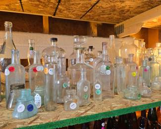 Extensive collection of antique bottles.