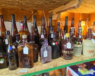 Extensive collection of antique bottles.