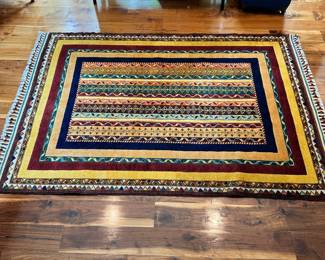 M26 - $350. Gorgeous colorful Topkapi Wool rug. Measures 51" x 75".