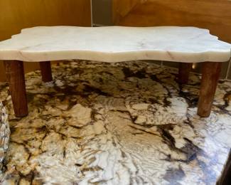 M1 - $25. Marble Riser with wood legs. 14" wide 7.5" deep 4.5" tall.