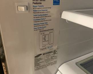 M132 - $100. Stainless Refrigerator. Samsung RF267 Series. 2010. Measures 36" wide x 32" deep x 70" tall. OWNER HAS UNPLUGGED AND DEFROSTED - I saw it running with my eyes. BUT he warns it is VERY cold and doesn't regulate the temperature quite right. Lettuce always freezes is his example. YOU NEED 2 STRONG PEOPLE TO MOVE! It is located in a walkout basement and will need to go around the home.