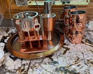 M16 - $30. Godinger Copper Bar set (missing jigger). PENDING. M17 - $15. Set of 4 Moscow Mule mugs.