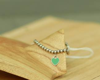 J37 - $90. Tiffany & Co. Blue Enamel Heart Charm.