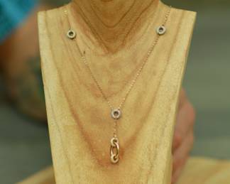 J49 - $150. 14k Gold Necklace with white gold accents. 17.5" chain. Weighs 2 grams.