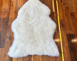 M72 - $40. "Natural" Brand sheepskin single. Measures 22" x 33"
