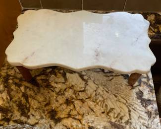 M1 - $25. Marble Riser with wood legs. 14" wide 7.5" deep 4.5" tall.